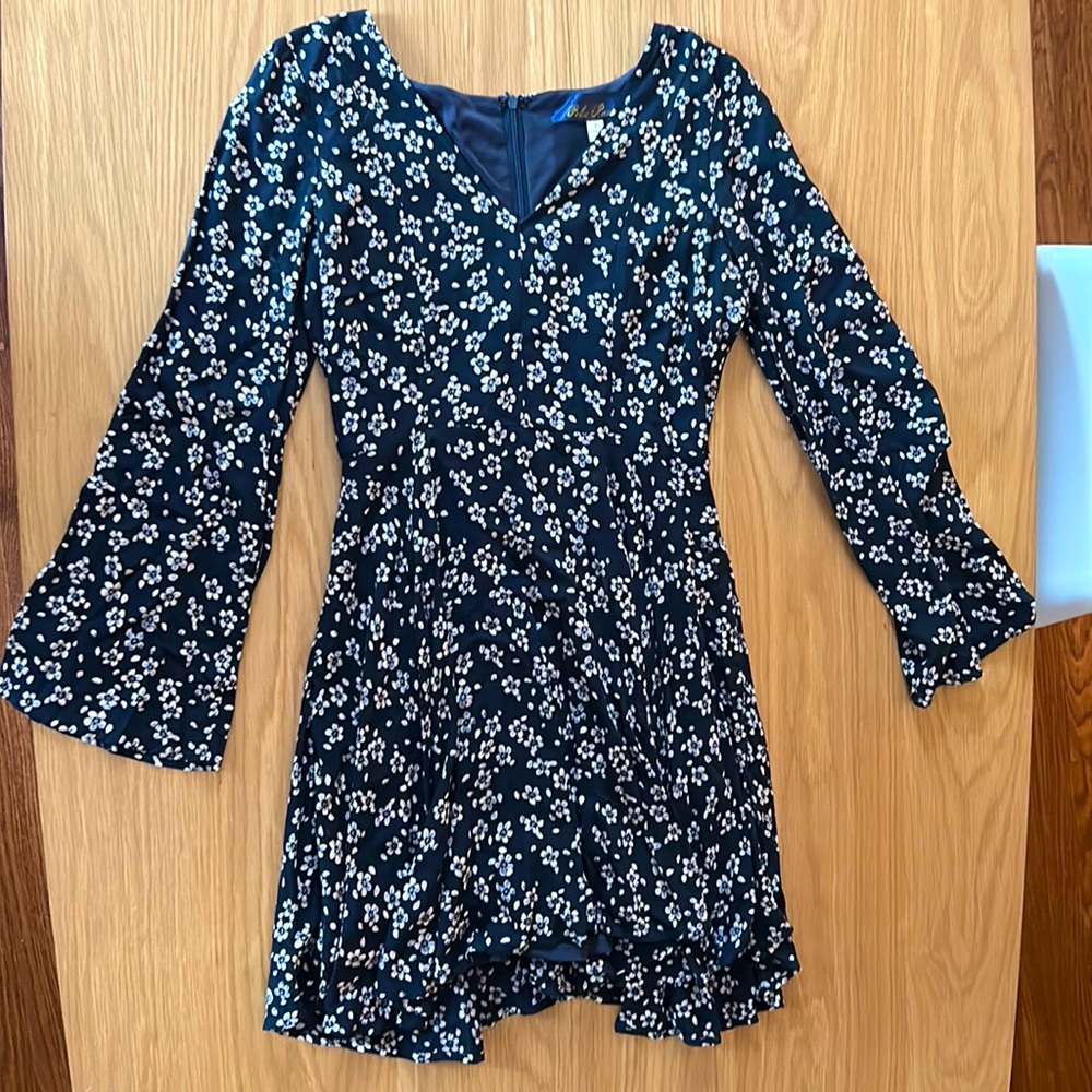 Dark blue v neck dress with bell sleeves